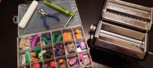 image of polymer clay set and equipment to make colorful earrings